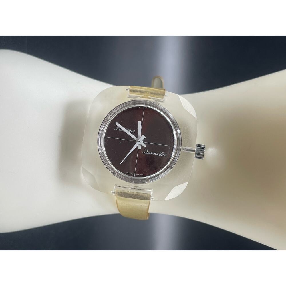 Lucerne Diamond Line Ladies Manual Watch Swiss Made Red Face Clear Band Wind Up